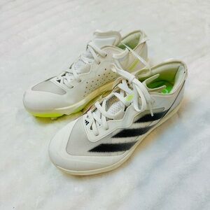 Adidas White and Black Athletic Shoes with Green Accents